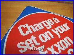 CHARGE A SET ON YOUR EXXON CREDIT CARD Original Gas Station Shop Tire Ad Sign