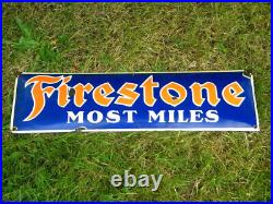 LARGE VINTAGE FIRESTONE MOST MILES PORCELAIN SIGN 27-1/2 x 7-3/4 TIRES OIL