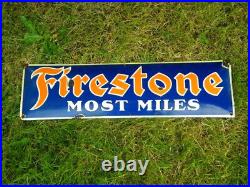 LARGE VINTAGE FIRESTONE MOST MILES PORCELAIN SIGN 27-1/2 x 7-3/4 TIRES OIL