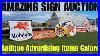 Searching-For-Deals-At-An-Estate-Auction-Full-Of-Vintage-Advertising-Signs-01-uc