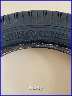 Vintage Cities Service Tires Display withOriginal Cities Service Brand Tire