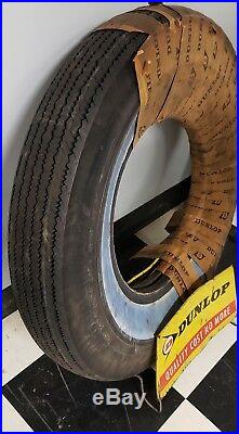 Vintage Dunlap tire and tire display stand
