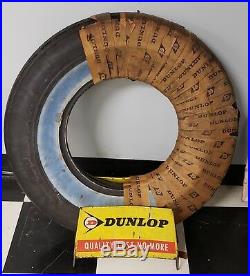 Vintage Dunlap tire and tire display stand