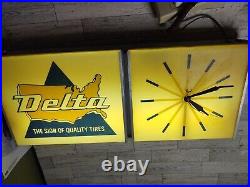 Vintage Light- Up 26 Long 11 Wide Delta Tires sign and clock
