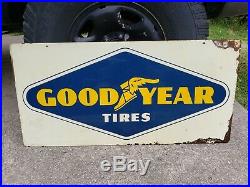 Vintage double sided Goodyear tire sign. 1943