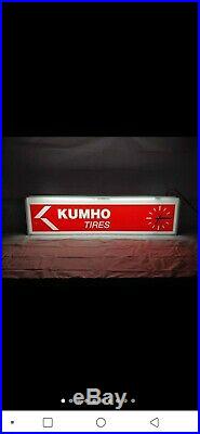 Vintage kumho tires lighted sign clock